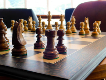 Close-up of chess on table