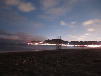 View of beach at sunset