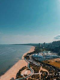 High angle view of sea against sky with beach