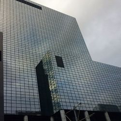 Low angle view of modern building against sky