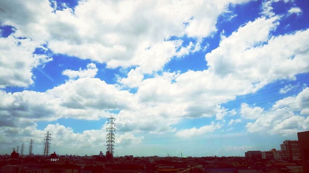 building exterior, sky, architecture, built structure, cloud - sky, cloudy, cloud, city, blue, cityscape, low angle view, residential structure, residential building, residential district, development, outdoors, building, house, day, no people