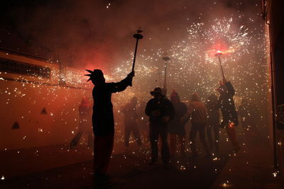 Correfoc parties, typical with firecrackers and lights in the towns