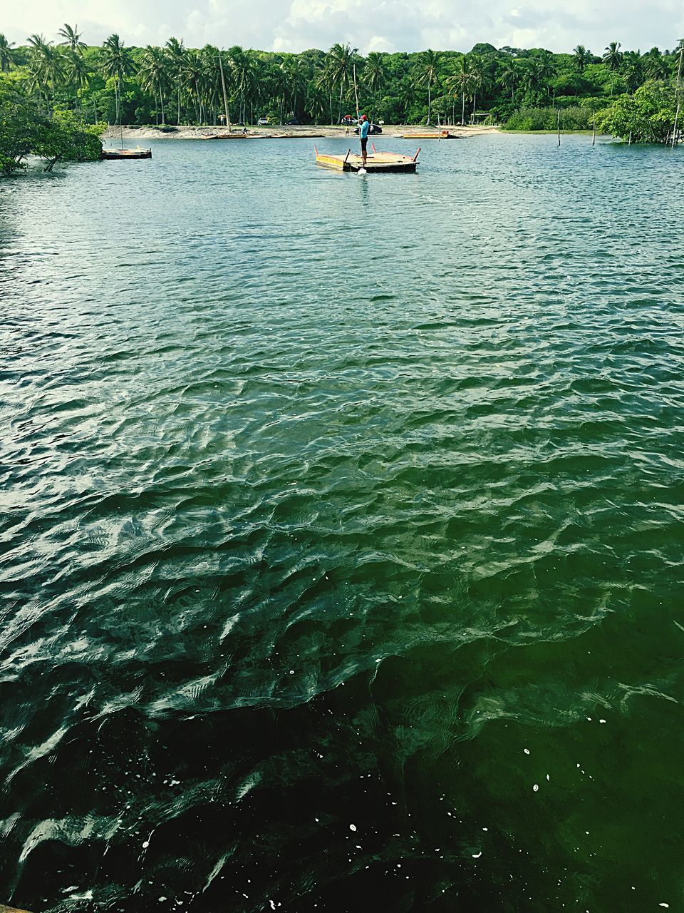 water, tree, nature, outdoors, real people, day, beauty in nature, nautical vessel, sky, people, adults only, adult