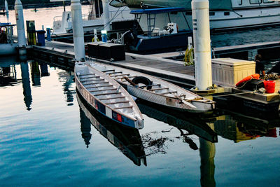 High angle view of boats moored at harbor