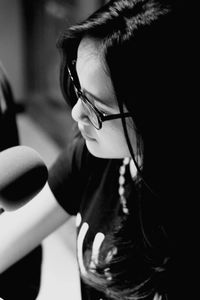 High angle view of female radio jockey in studio