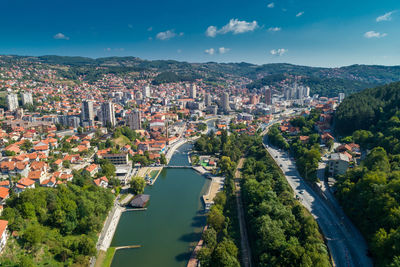 High angle view of townscape against sky in city