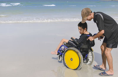 Couple kissing on beach