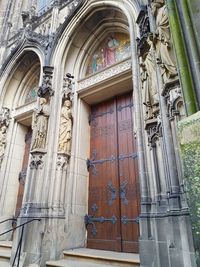 Low angle view of statues on building