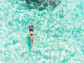 Woman swimming in the caribbean