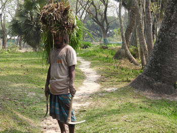 Man standing on a village road 