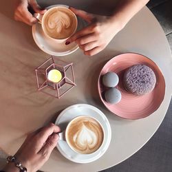 High angle view of coffee cup on table