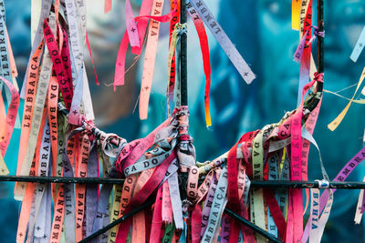 Colored ribbons of senhor do bonfim tied to an iron gate in pelourinho.