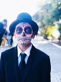 Portrait of boy with face paint