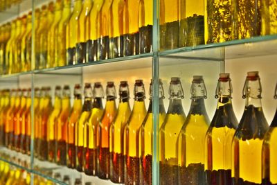 Infused oil bottles in rack