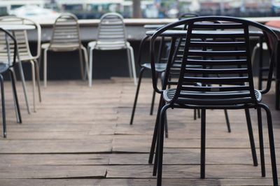 Empty chairs and table in cafe