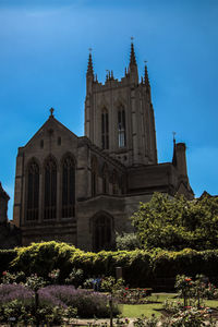 Low angle view of church against blue sky