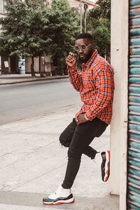 Full length of man standing on street