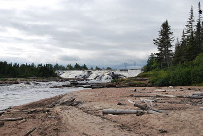 Scenic view of beach against sky