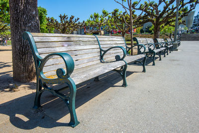 Empty bench in park