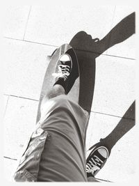 Man standing on tiled floor