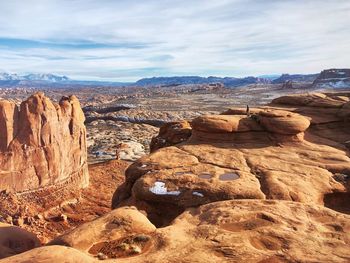 Panoramic view of rock formations against sky