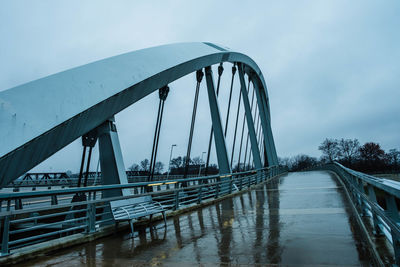 Bridge over river against sky