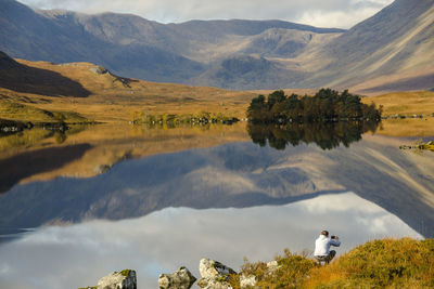 Scenic view of lake and mountains