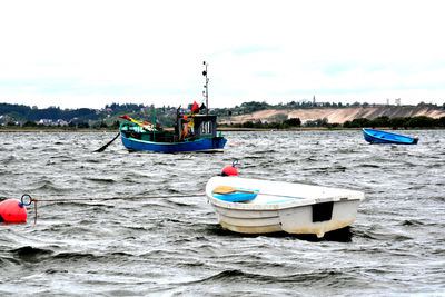 Boats in sea