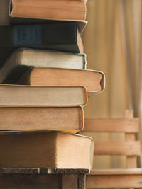 Close-up of stacked books on table