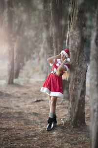 Full length of woman in forest