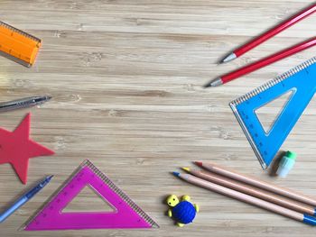 Directly above shot of school supplies on table