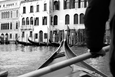 Reflection of man on boat in canal