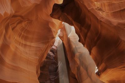 Midsection of woman in cave