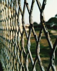 Close-up of barbed wire chainlink fence
