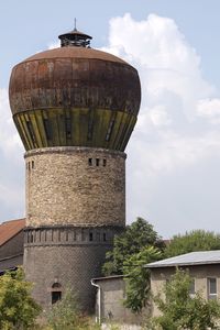 Low angle view of water tower against sky