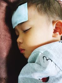 Close-up portrait of boy looking away