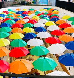 Multi colored umbrellas in row