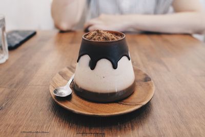 Close-up of coffee cup on table