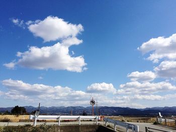 View of landscape against cloudy sky
