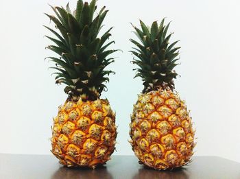 Close-up of fruits against white background