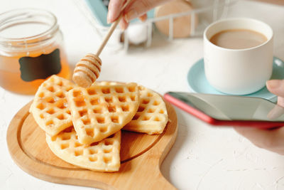 Close-up of coffee cup on table