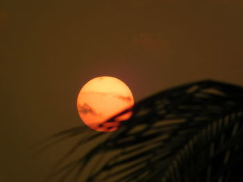 Close-up of sun against sky during sunset