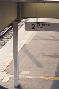 High angle view of parking sign on floor