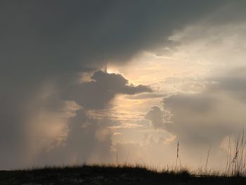 Low angle view of dramatic sky during sunset