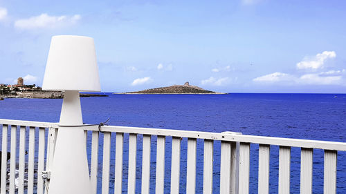 Panoramic view of sea against blue sky