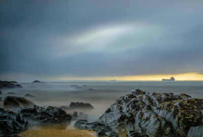 Scenic view of sea against sky during sunset