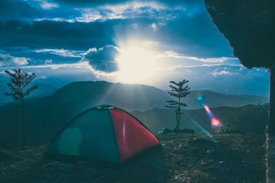 View of tent against cloudy sky