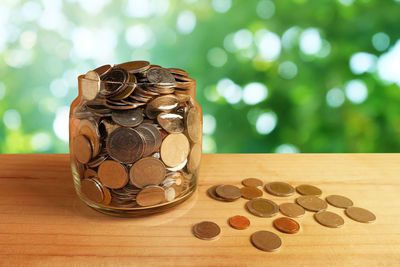 Close-up of coins on table