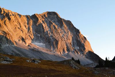 Scenic view of rocky mountains against clear sky