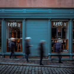 People walking on street in city